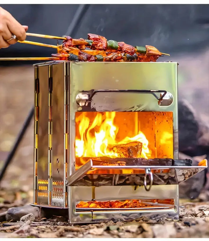 Portable stainless steel foldable wood stove for outdoor camping, hiking & backpacking cooking.