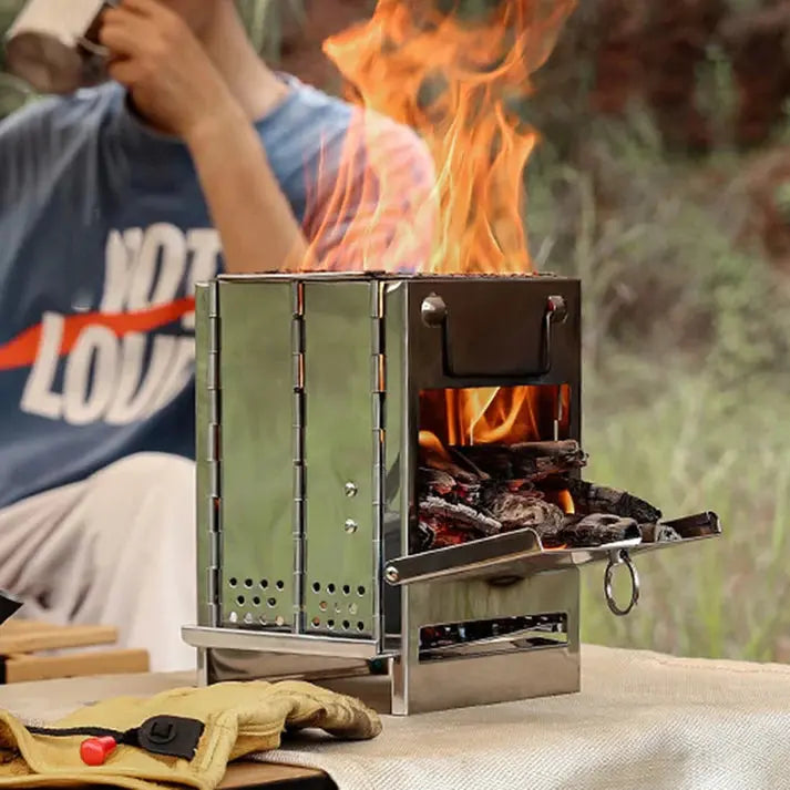 Easy-to-assemble foldable stainless steel wood stove, ideal for outdoor cooking, picnics & camping.