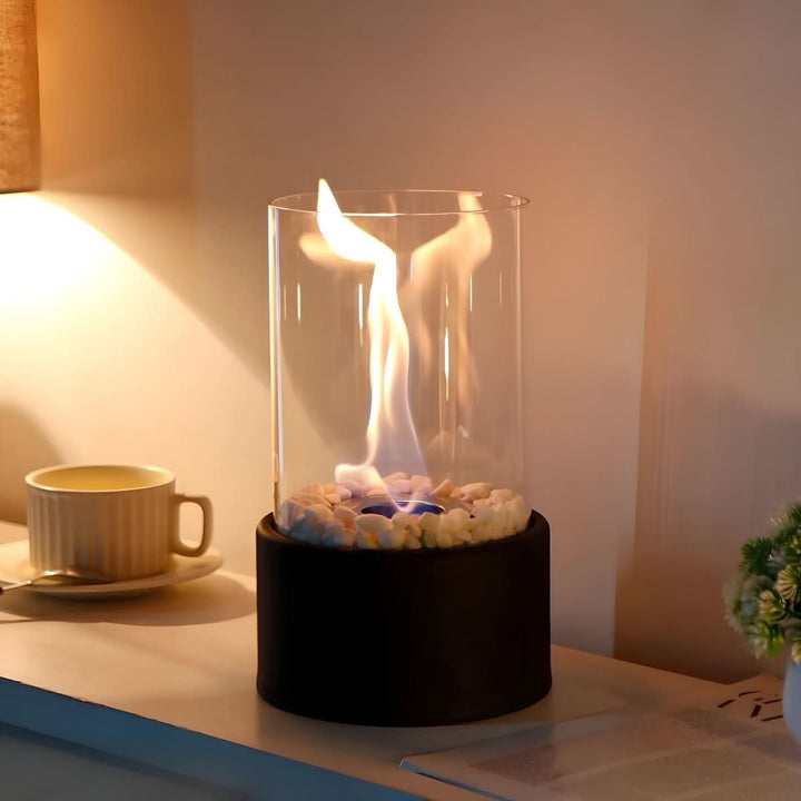 Clean-burning bioethanol tabletop fireplace, portable design for versatile indoor/outdoor ambiance.