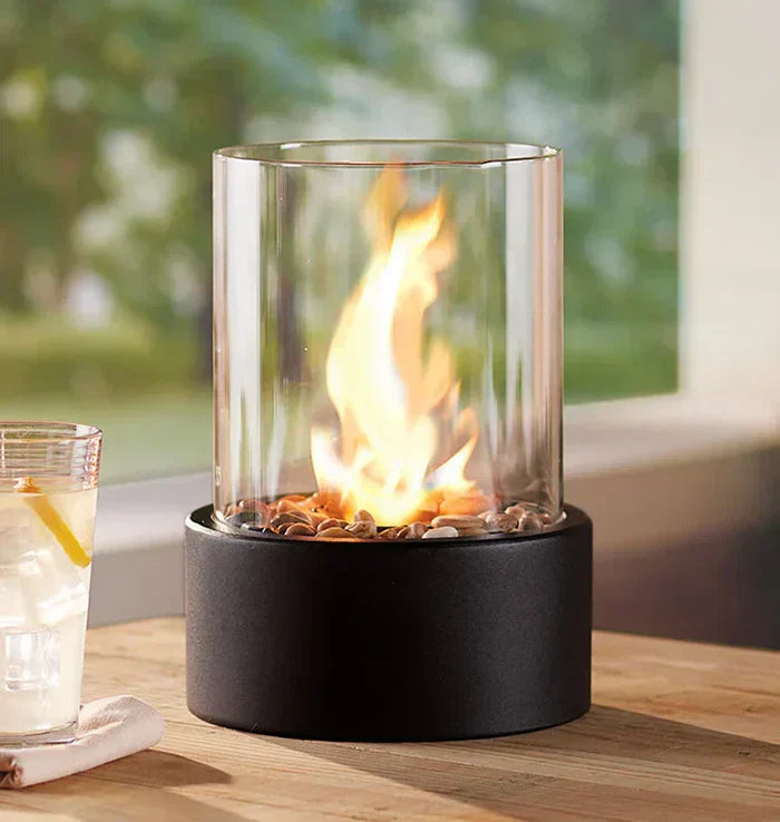 Tabletop fire lantern, sleek black finish, perfect for contemporary garden and home decor.