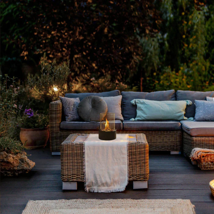 Outdoor lighting: a portable tabletop fire pit, adding a warm flame feature to any setting.