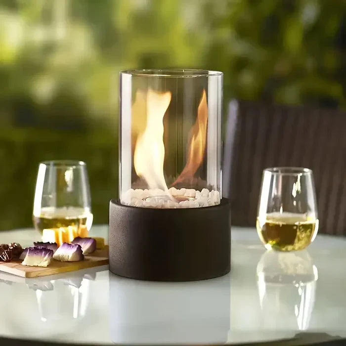 Decorative tabletop fire lantern, featuring a secure glass enclosure for safe flame enjoyment.