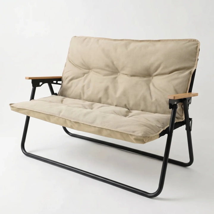 Compact two-person camping sofa. Portable outdoor seating, a folding bench for camp or patio comfort.