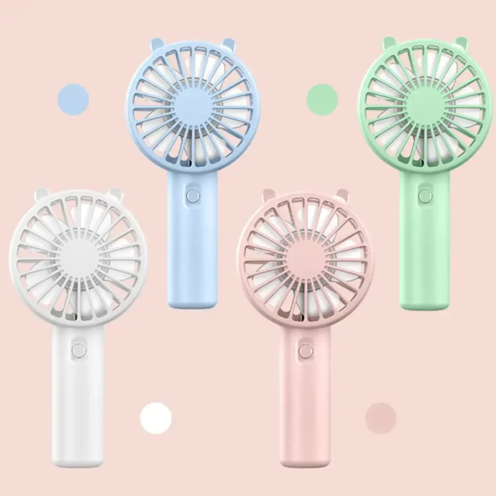 White portable USB mini fan, a modern personal cooling device for everyday use.