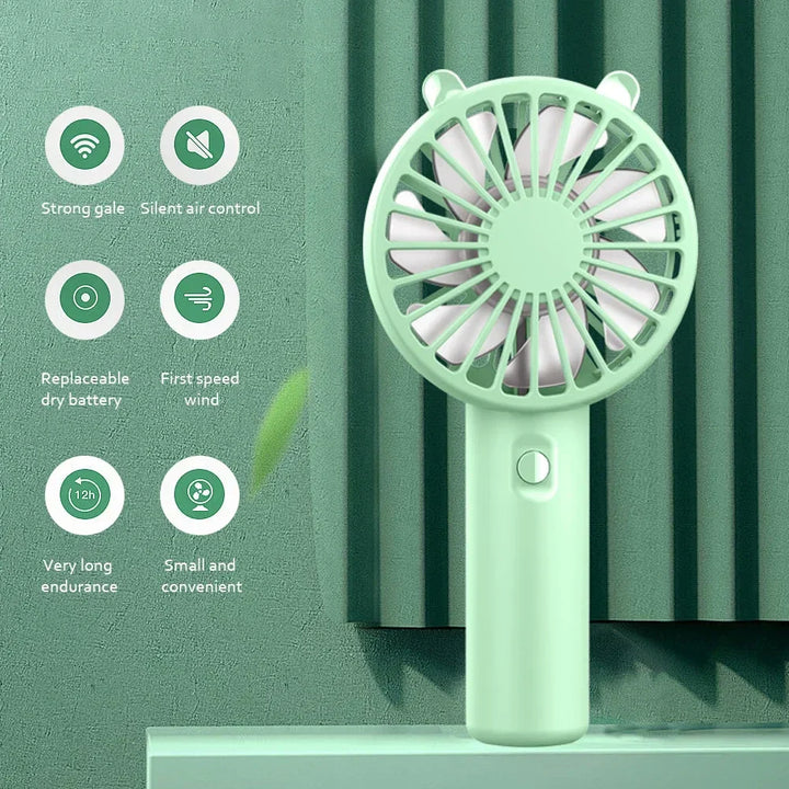 Handheld rechargeable fan, offers powerful airflow despite its mini, compact size.