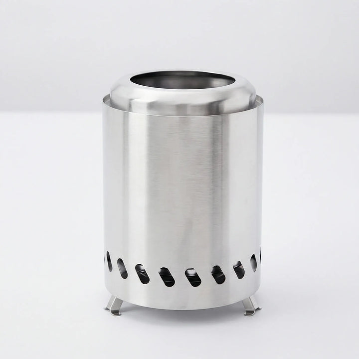 Stainless steel wood burning survival stove for bushcraft & hiking gear. Compact & efficient.