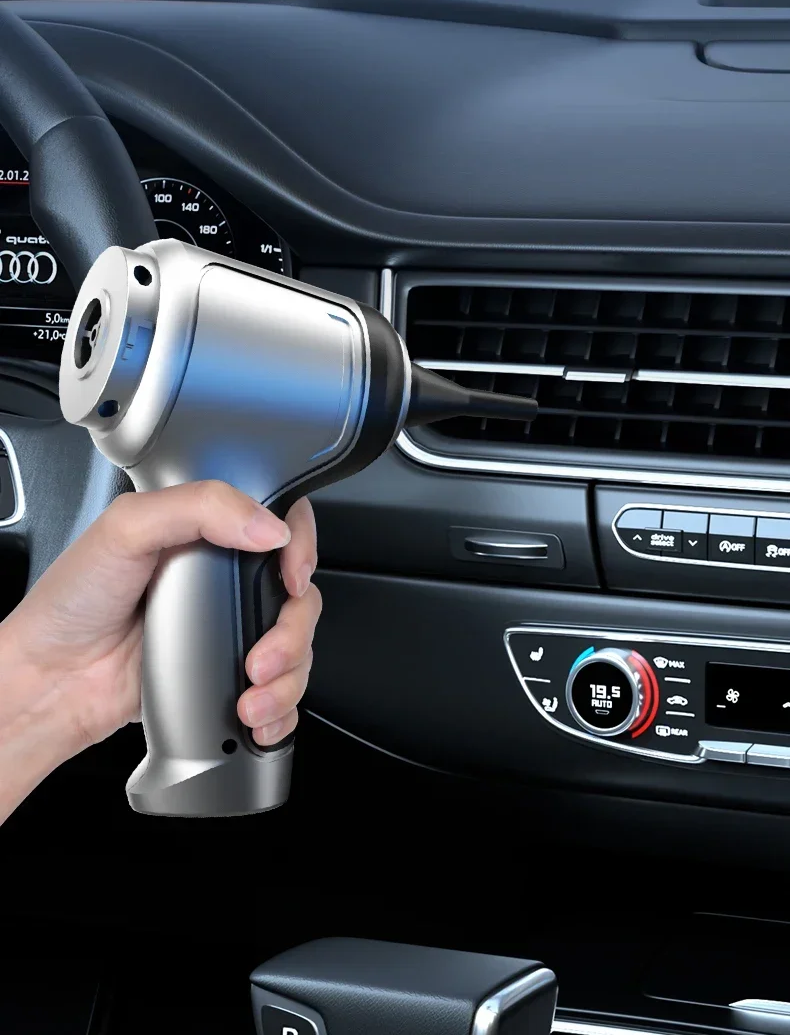 Cordless car vacuum cleaner in action, removing debris from car interior for spotless auto detailing.