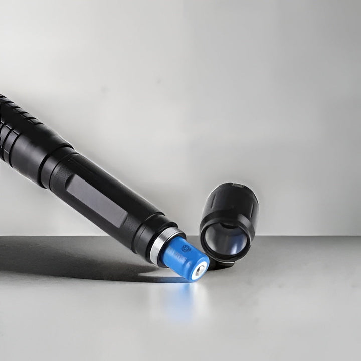 Durable tactical laser torch for camping, hiking, and outdoor survival; includes fire starter.