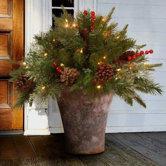 Pre-lit Christmas urn filler with LED lights, realistic pine cones & evergreen branches for festive holiday decor.