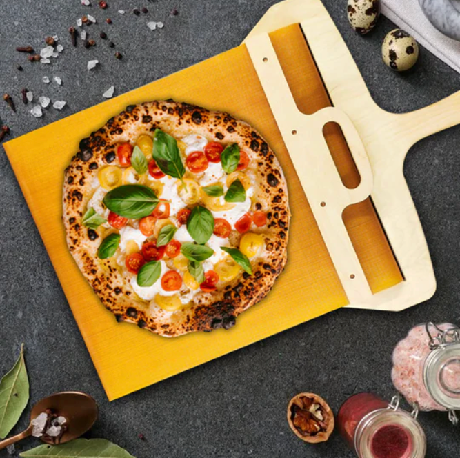 Premium birch wood pizza peel, an essential kitchen tool for home bakers making homemade pizzas.