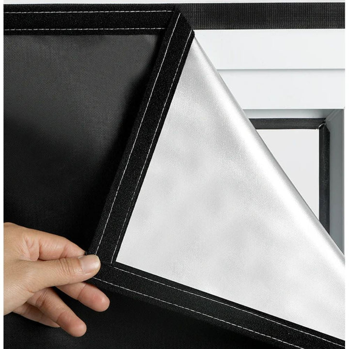 Adhesive-free static cling blackout window shade for sun block, heat control, & UV protection.