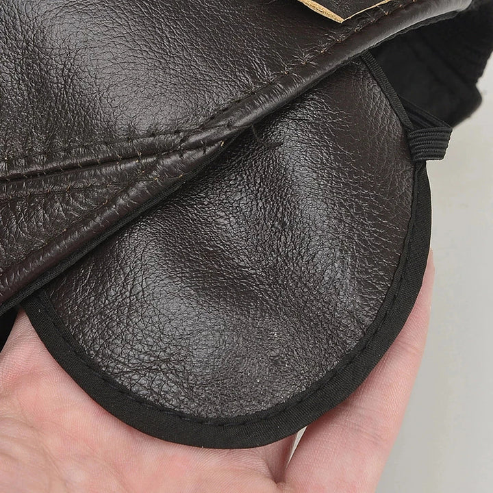 Fashionable unisex brown leather cap, an adjustable cowhide headwear accessory. Durable for men's & women's style.
