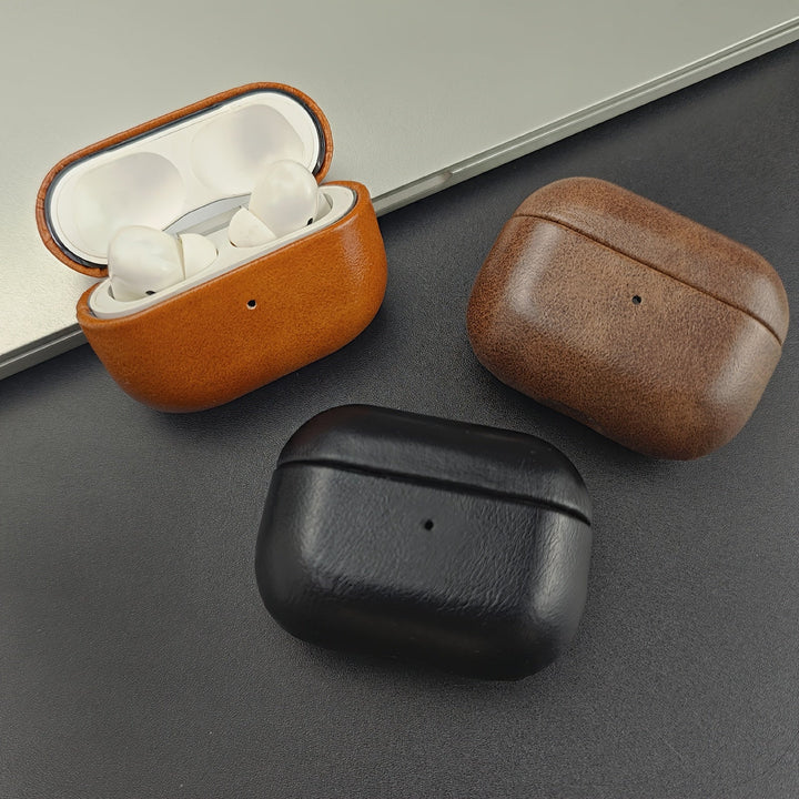 Stylish unisex AirPods case in premium full grain leather. Durable earbud protection, supports wireless charging.