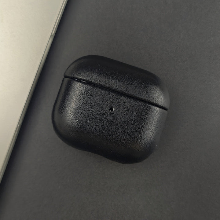 High-quality full grain leather AirPods case. Protective, stylish tech accessory for earbuds, wireless charging.