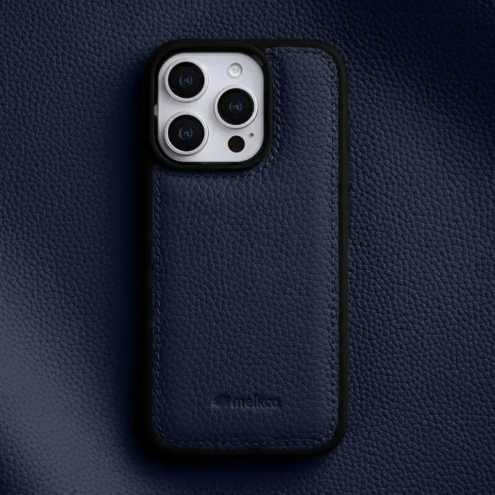Close-up of rich Italian leather iPhone case texture. Luxury, precise fit for iPhone 14, 15, 16.