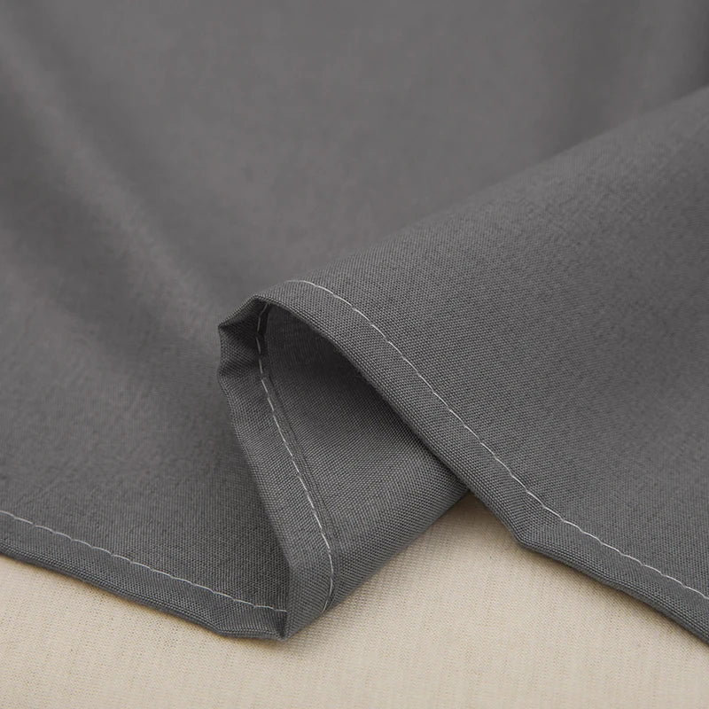 Textured close-up of premium linen duvet cover, highlighting its soft, breathable weave for ultimate comfort.