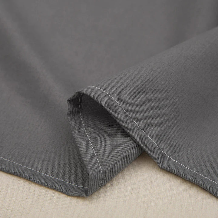 Textured close-up of premium linen duvet cover, highlighting its soft, breathable weave for ultimate comfort.