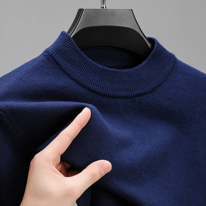 Soft men's cashmere sweater with a distinctive elegant hem, offering premium comfort and style.