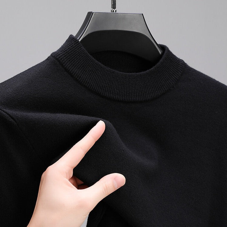 Stylish men's cashmere sweater, a sophisticated long sleeve crew neck piece for elegant layering.