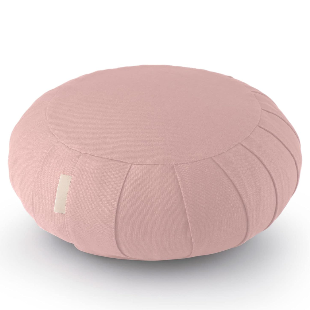 Elegant organic cotton meditation cushion, buckwheat filling, promoting mindful posture and deep relaxation.