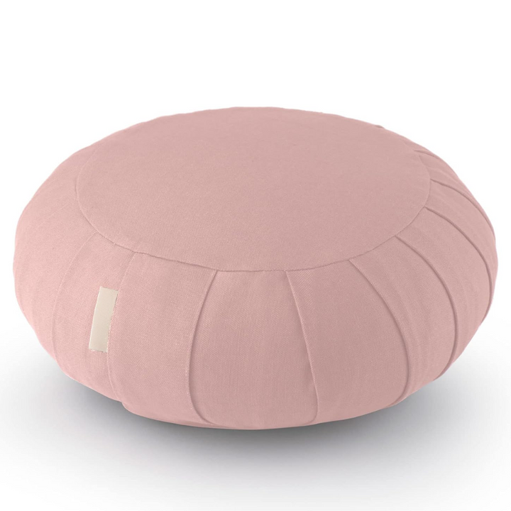 Elegant organic cotton meditation cushion, buckwheat filling, promoting mindful posture and deep relaxation.
