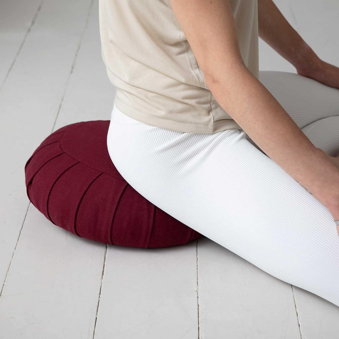 Eco-friendly meditation cushion; organic cotton cover, buckwheat filling, ideal for yoga & comfortable support.