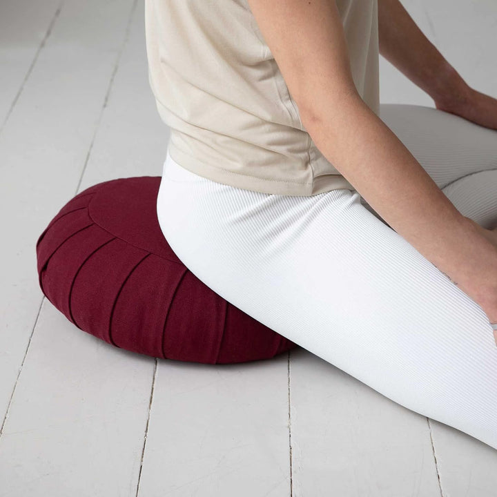 Eco-friendly meditation cushion; organic cotton cover, buckwheat filling, ideal for yoga & comfortable support.