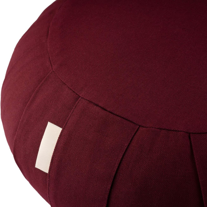 Sustainable buckwheat hull meditation cushion; organic cotton cover for eco-conscious yoga & meditation.
