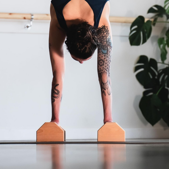 Versatile wooden push-up bars & parallettes for calisthenics, core strength, and fitness training.