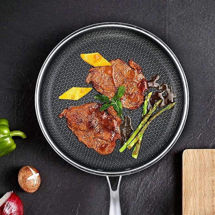 Durable scratch-resistant stainless steel frying pan. Non-stick coating, built for everyday home cooking, chef quality.