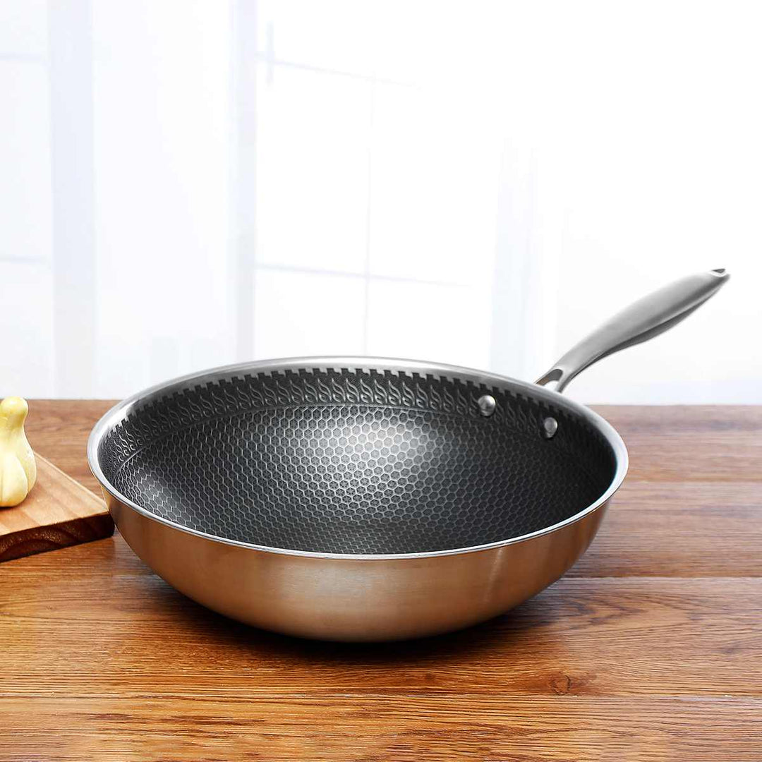 Induction & oven safe non-stick frying pan. Scratch-resistant stainless steel, versatile cookware for all kitchens.