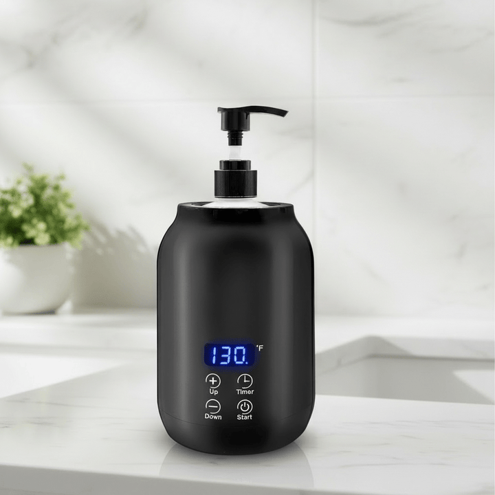 Professional electric massage oil warmer for spa and salon, ideal for heated aromatherapy & wellness treatments.