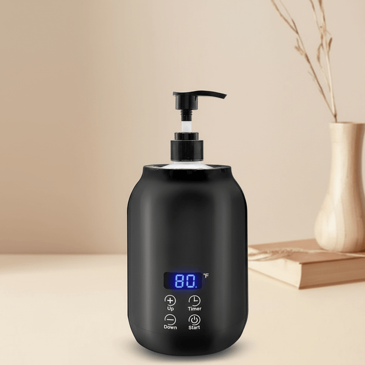 Electric massage oil warmer for beauty professionals & therapists; provides soothing warm oil for client comfort.