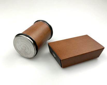 Compact professional kitchen knife sharpener with diamond roller for easy storage.