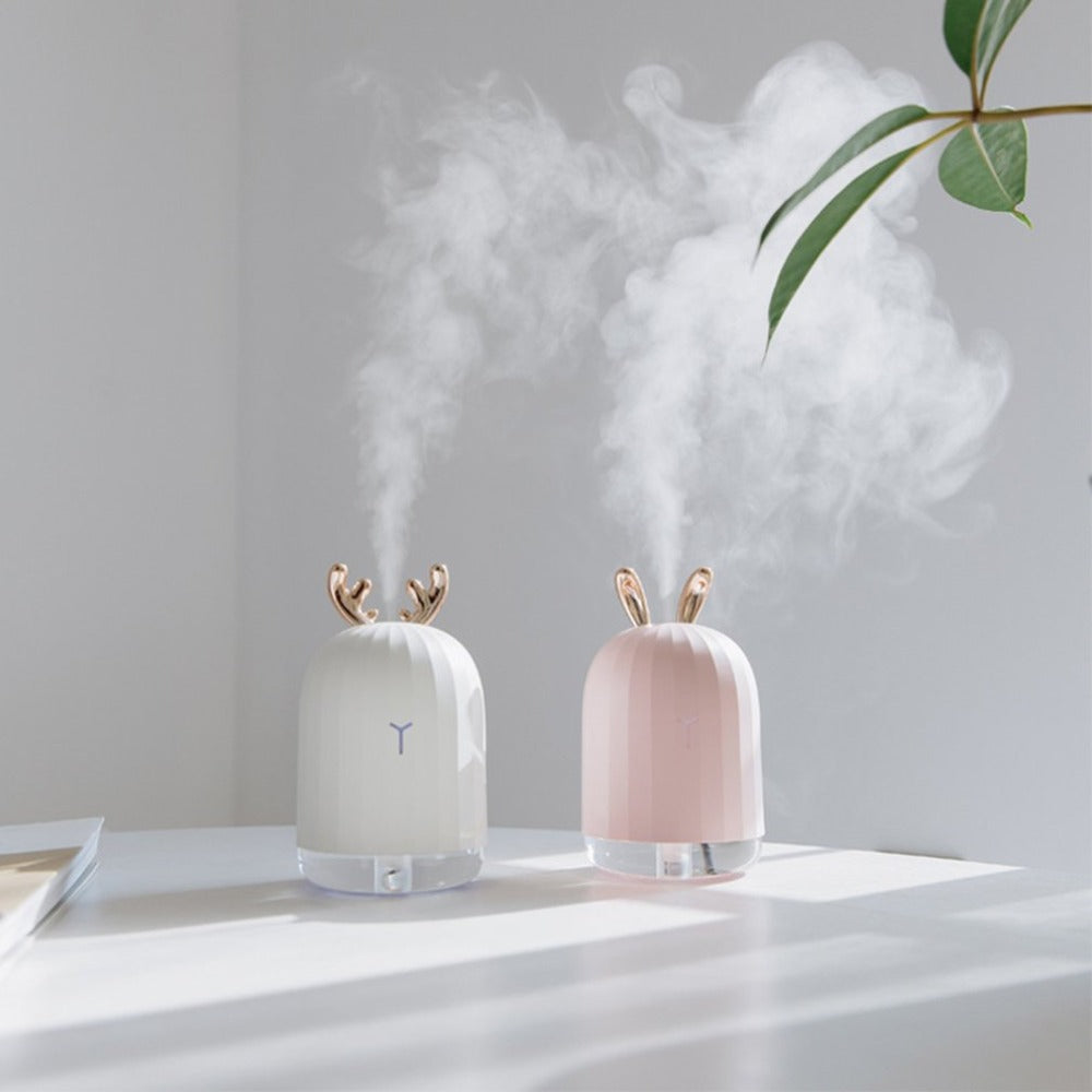 Cute fawn humidifier & air purifier for kids' rooms. USB charge, soft night light for peaceful sleep.