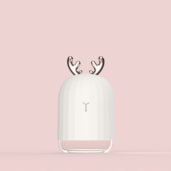 Baby nursery humidifier with charming bunny design. Soothing night light & convenient USB power.