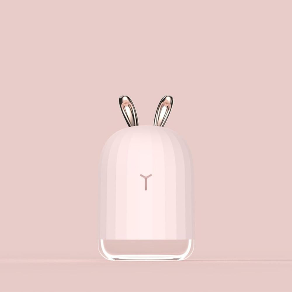 Compact PureBunny humidifier & night light for kids. USB powered, ideal for child's bedroom.