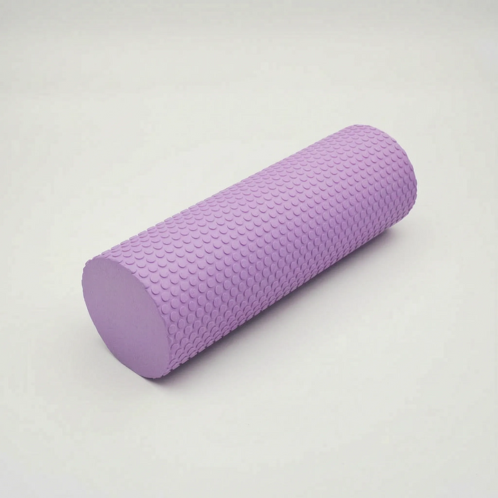 Firm purple high-density foam roller for post-workout muscle soreness and full body stretching.