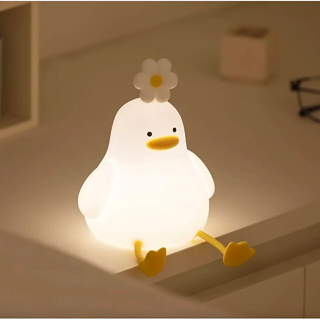 QuackLight LED duck night light, adorable kids lamp for nursery or children's room, soft glow.