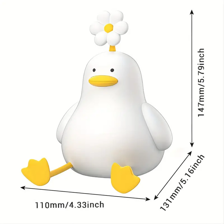 Adorable QuackLight duck night light, a thoughtful baby gift, LED lamp with soft, adjustable glow for nursery.