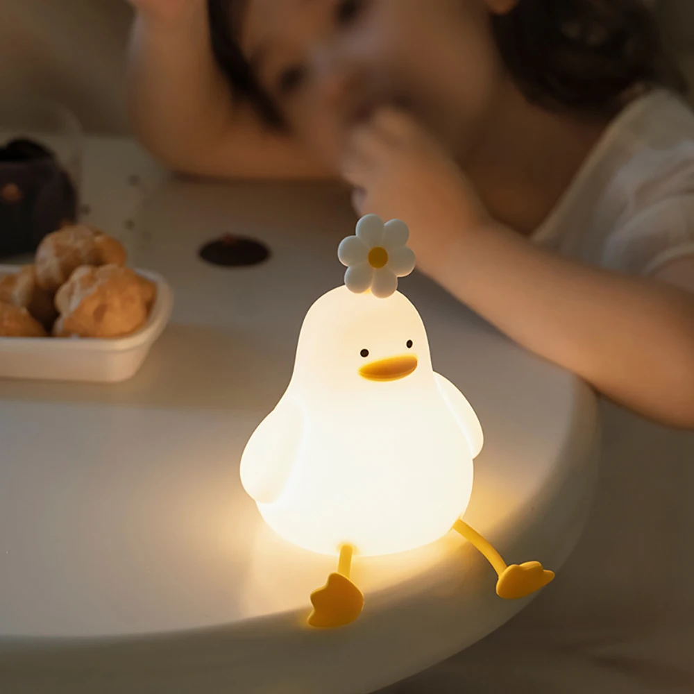 Cute duck night light, QuackLight LED lamp, perfect baby gift for nursery, offers a gentle, calming glow.