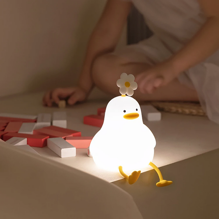 Kids' QuackLight LED duck night light, a charming nursery lamp with a soft, adjustable glow for children.