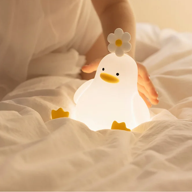 QuackLight LED duck nightlight, a fun and functional kids lamp providing comforting light for bedtime in any room.