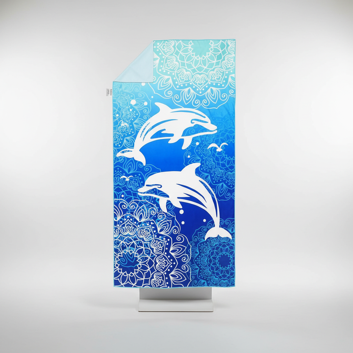Stylish TropicalTouch multi-purpose towel for beach & travel, featuring a vibrant tropical print & quick dry