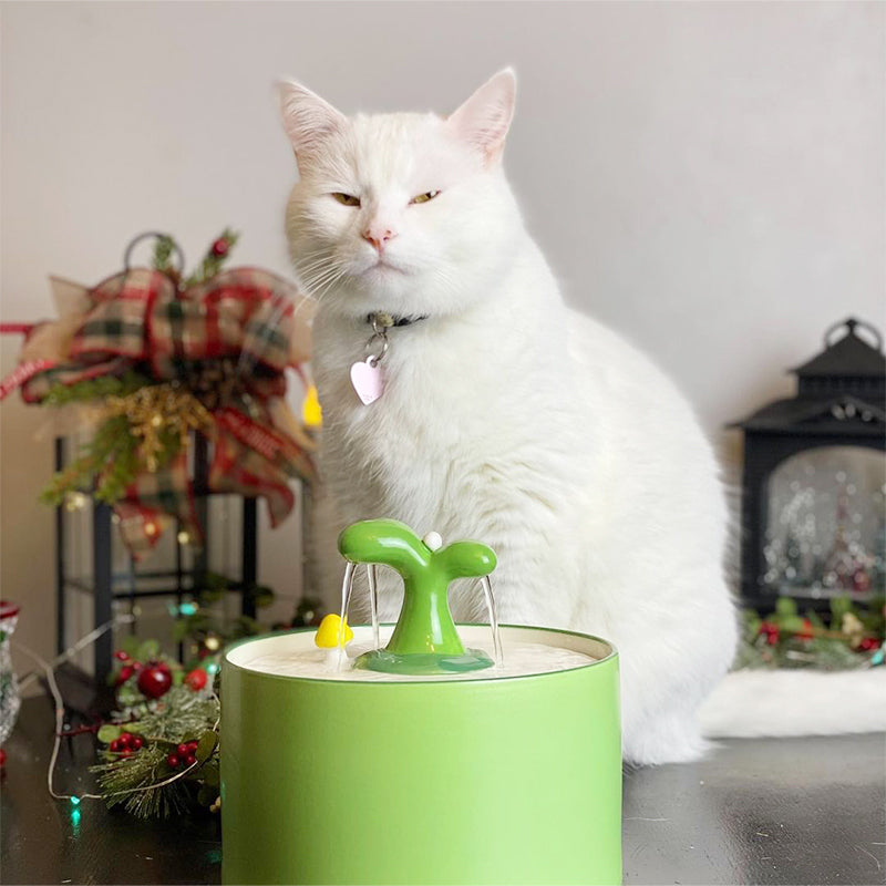 Silent ceramic cat water fountain, automatic and filtered, ideal for quiet pet hydration.