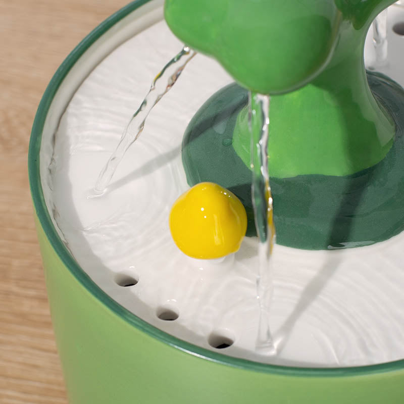 Automatic ceramic cat water fountain with quiet operation, essential for pet hydration.