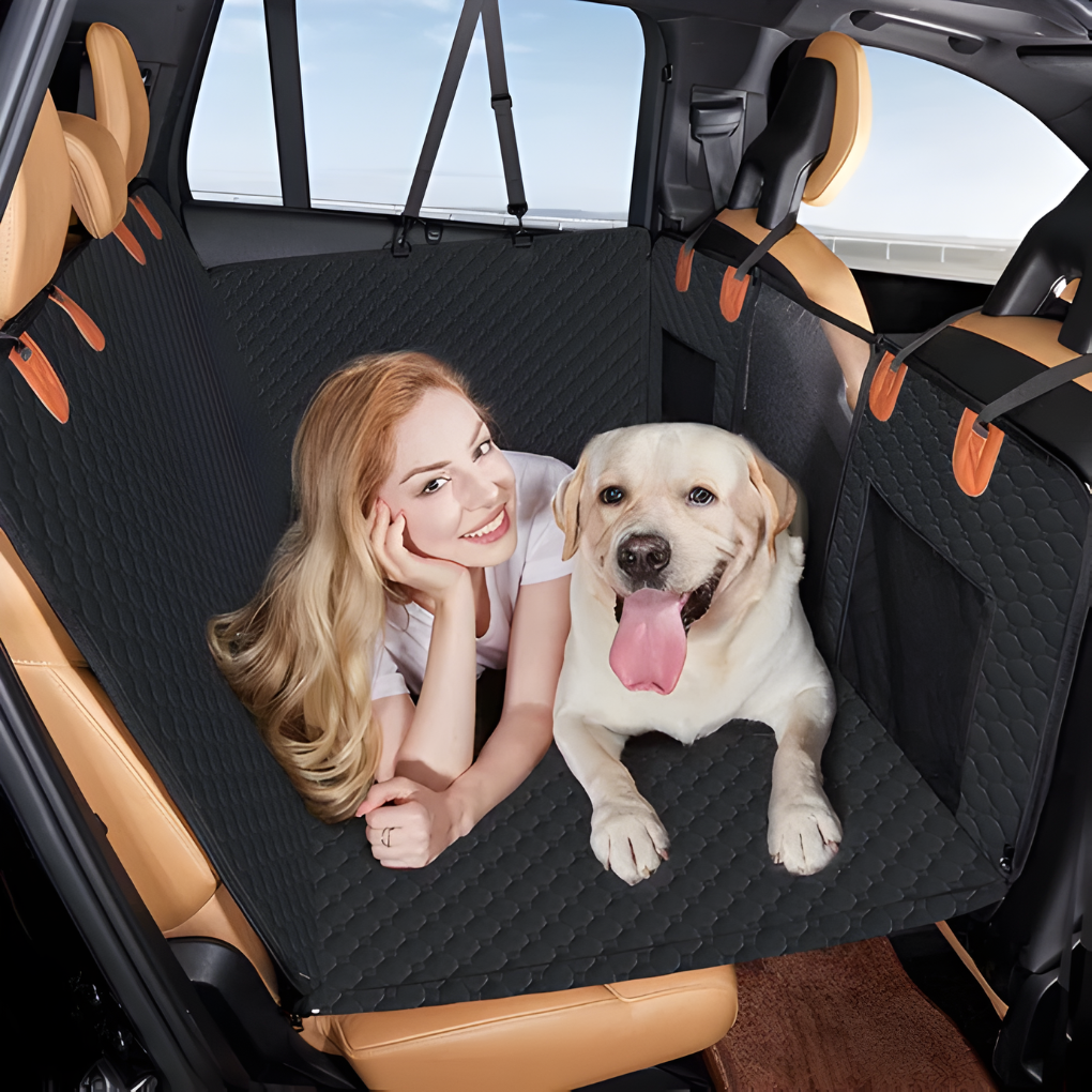 Quilted dog car seat extender provides safe, comfortable travel for pets in vehicle back seat. Ideal for road trips.