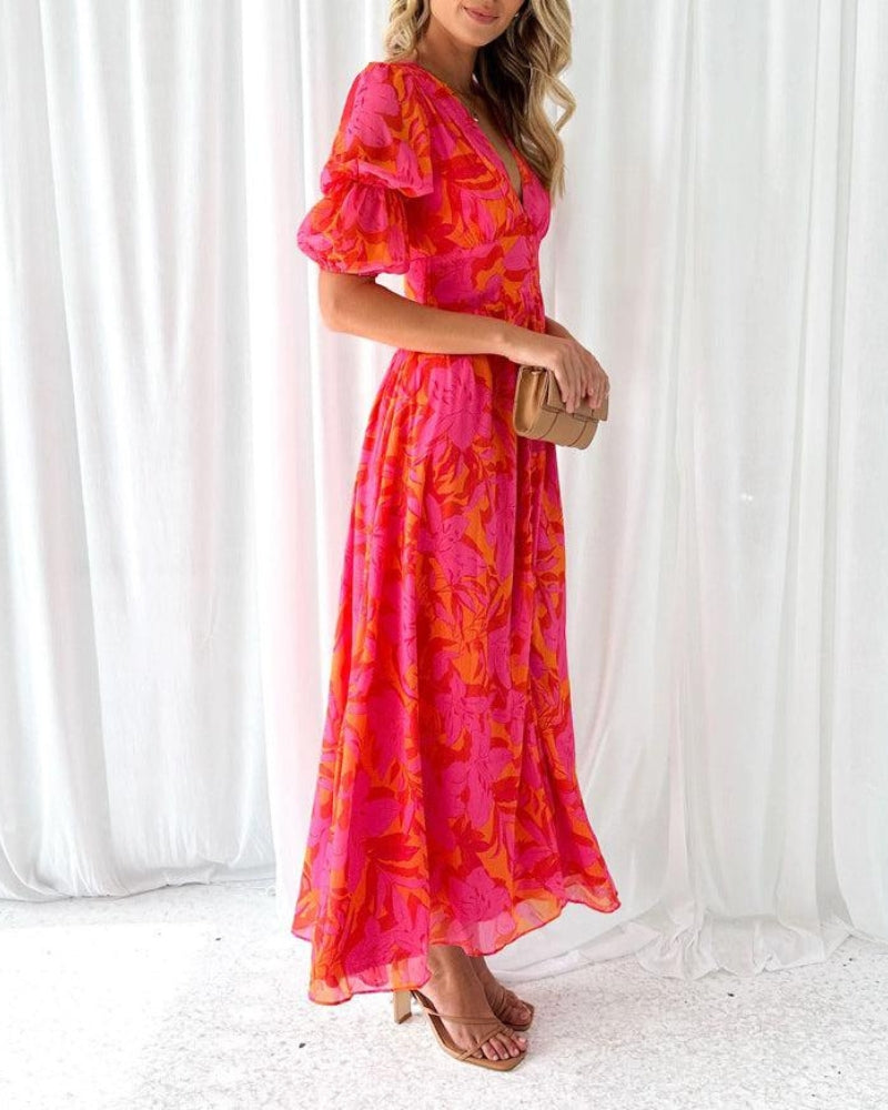 Elegant women's radiant flowy maxi dress, a comfortable V-neck summer dress with puff sleeves, ideal for any occasion.