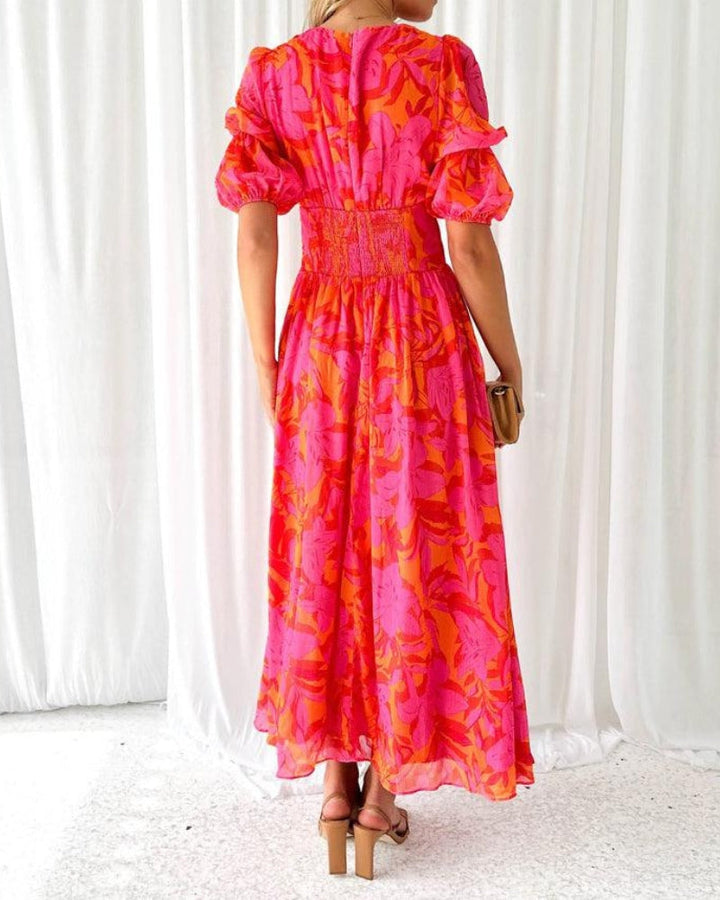 Chic women's radiant maxi dress with flowy fabric, V-neck, and puff sleeves; comfortable long dress for elegant summer style.