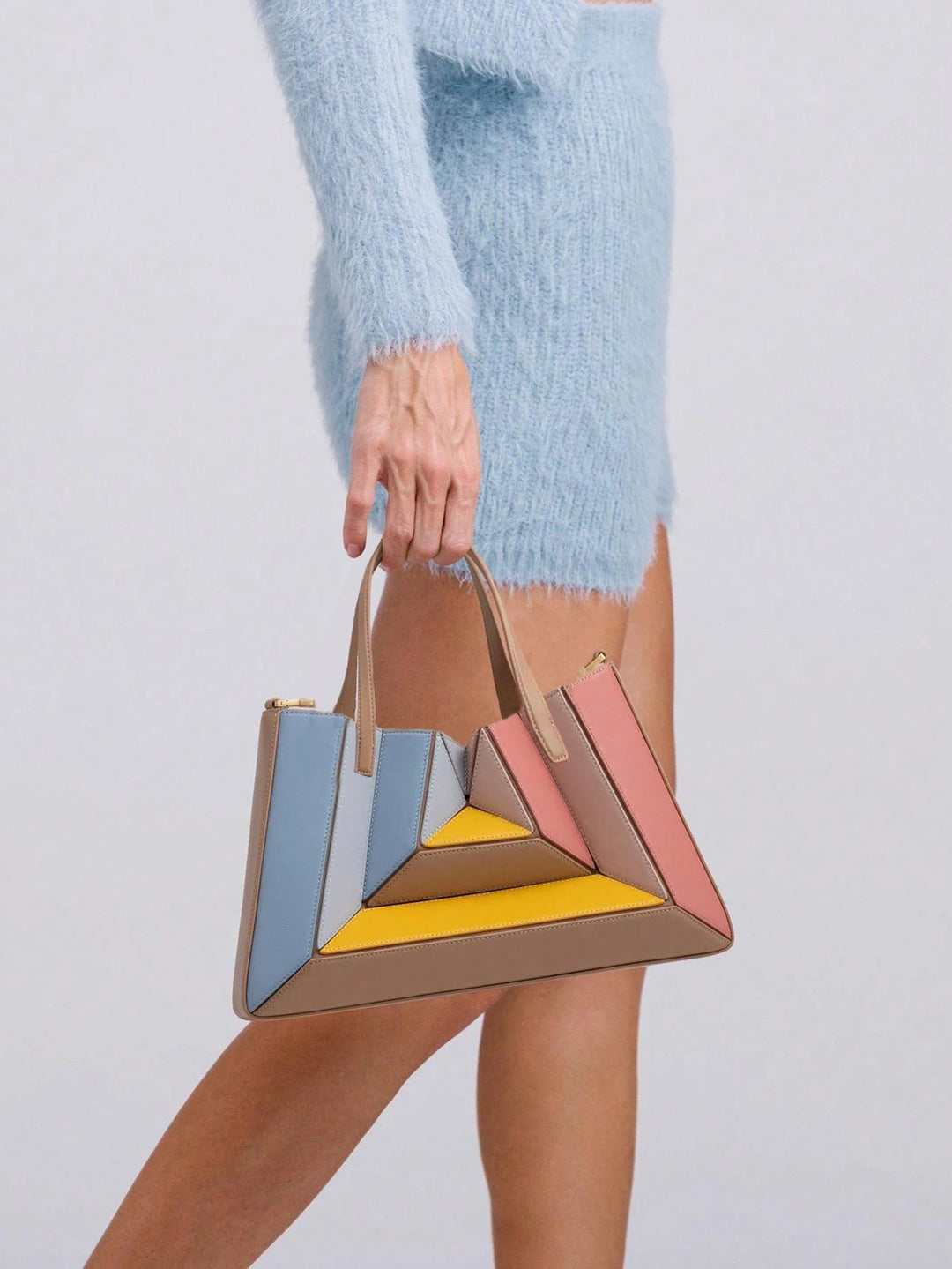 Geometric vegan leather handbag for women. Luxurious ethical fashion statement purse, perfect for any outfit.